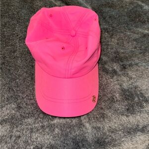 Lilly Pulitzer hot pink athletic hat.